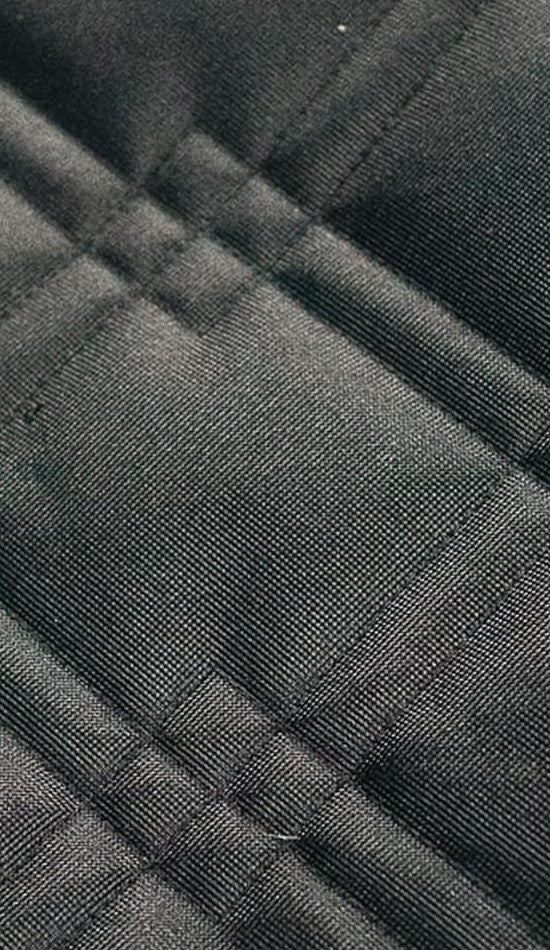 Close-up of the actual Bulldogology quilted waterproof fabric