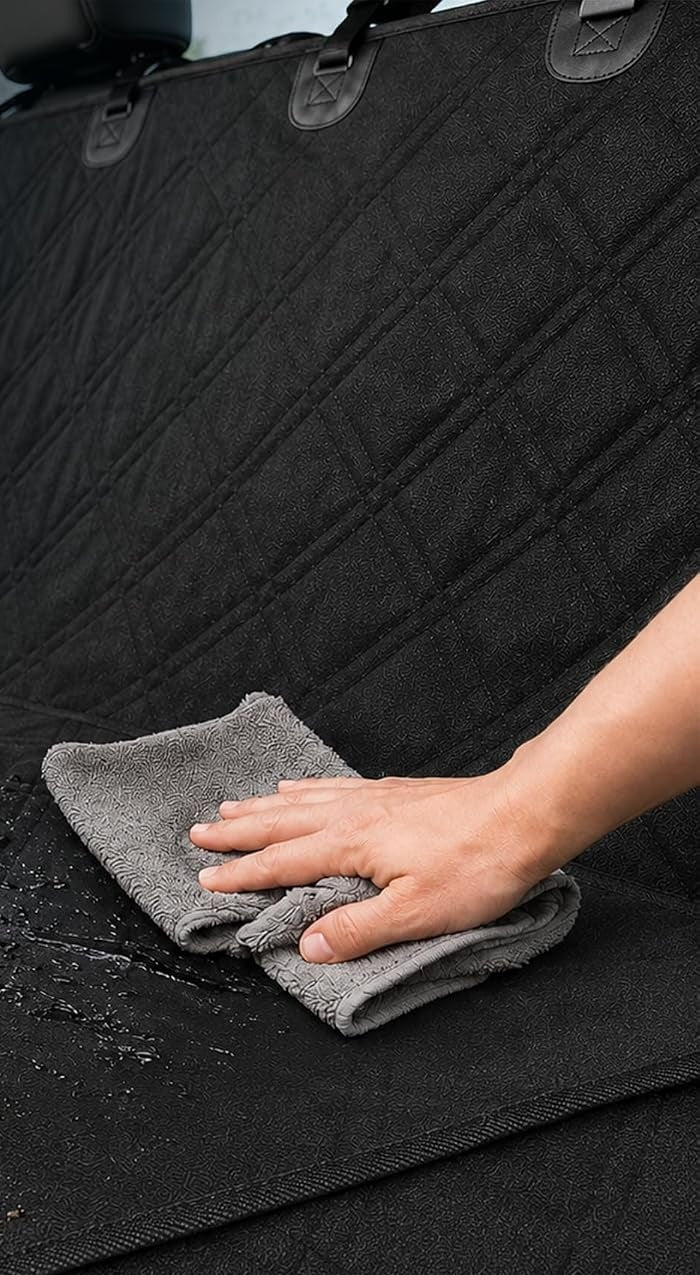 Wiping mud off the actual Bulldogology waterproof seat cover